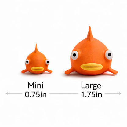 Two orange fish-shaped toys, one labeled 'Mini' and the other 'Large', on a white background.